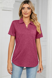V-neck polo tee in heathered magenta with short sleeves and a chest pocket.