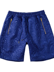 Royal blue jacquard paisley shorts with zip pockets and drawstring waist