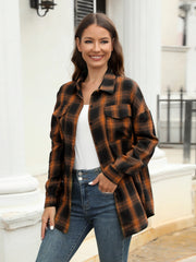 Brown and black plaid button-up shirt with two chest pockets.