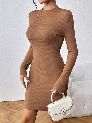 Tan ribbed backless mini dress with long sleeves and a sculpted fit.