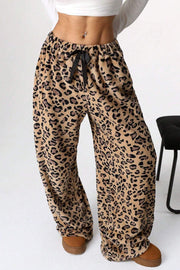 Leopard plush palazzo lounge pants with black drawstring detail.