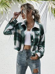 Cropped dark green plaid shacket with patch pockets and button front.