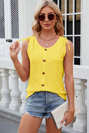 Yellow eyelet tank top with tie shoulders and button front
