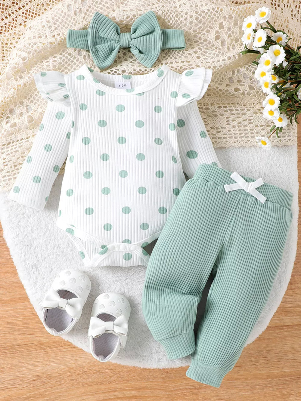 Children's Ruffled Polka Dot Bodysuit And Pants Set in Light Green, front view