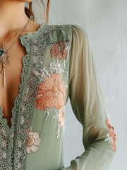 Green floral embroidered lace blouse with deep V-neck and bishop sleeves