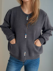 Dark Gray ribbed knit button-up cardigan with pastel buttons and pockets