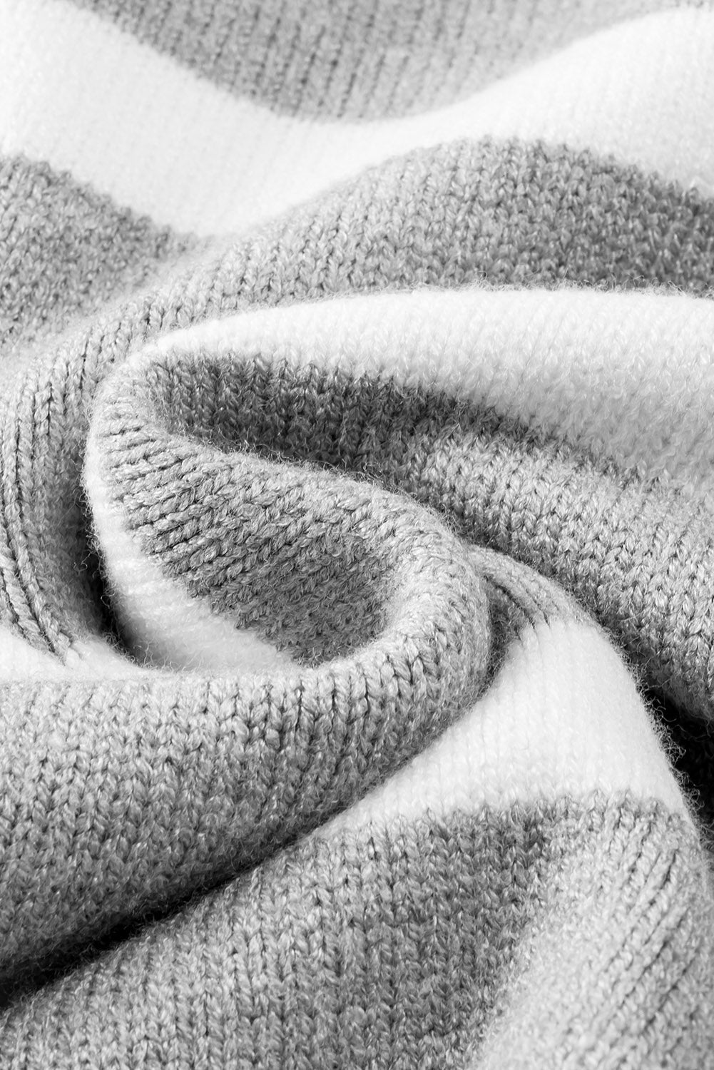 Light gray and white striped knit pullover sweater with wide collar detail.