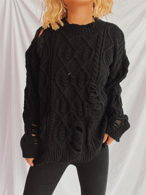 Black distressed cable knit sweater with ripped details and crew neck.