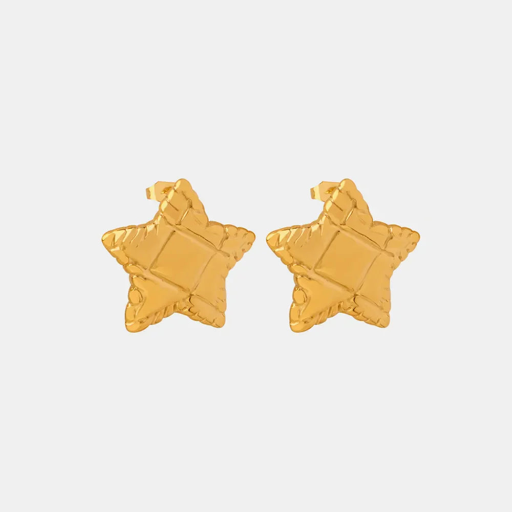 Textured gold star stud earrings with a celestial, cosmic design.