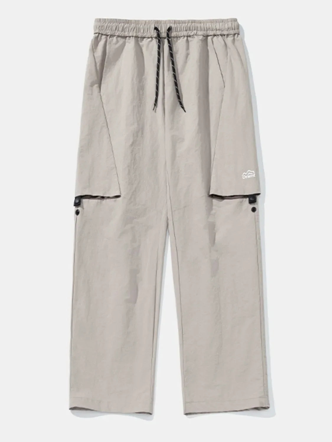 Gray cargo pants with drawstring waist and black trim pockets.