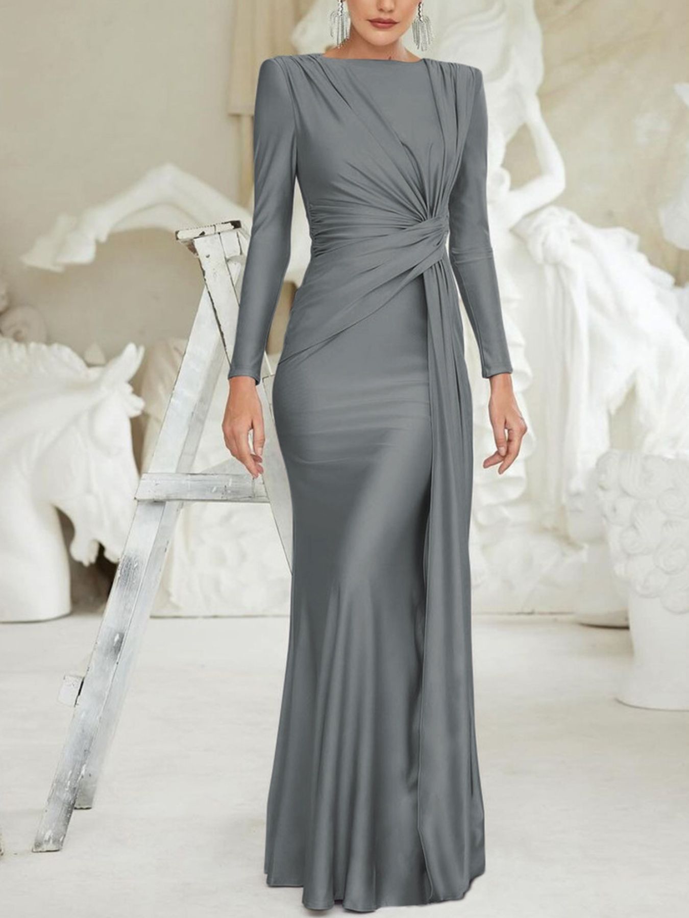 Gray ruched knot front maxi dress with long sleeves and a draped detail.
