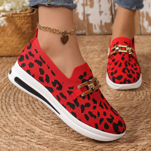 Red leopard print mesh slip-on shoes with gold buckle detail.