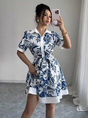 Floral print mini dress with tie belt in white and blue, short sleeves, collared neckline