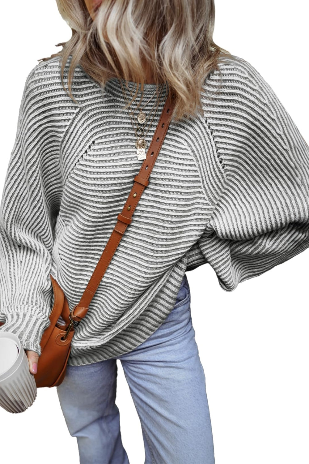 Gray striped batwing knit sweater with textured detail and crew neck.