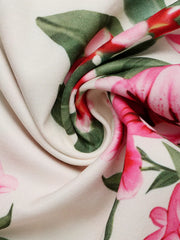 Charming Floral V-neck Midi Dress in white with pink and green floral print.