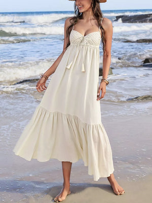 Cream ruched sweetheart neck maxi swim dress with crochet bodice and tassel ties.