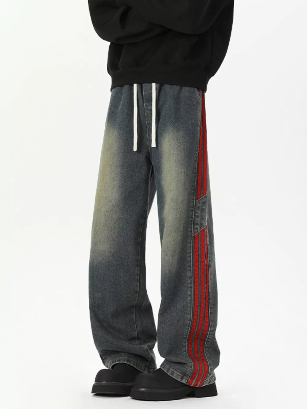 Relaxed fit wide-leg jeans in Vintage Blue with red striped detail and drawstring waist.