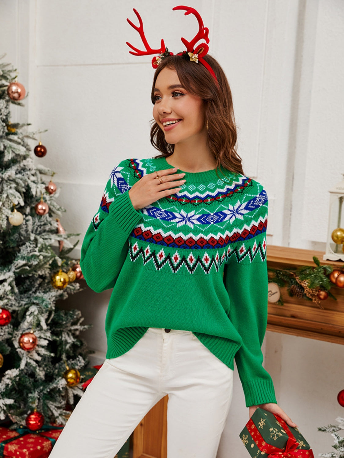 Green crewneck sweater with festive Fair Isle pattern, acrylic knit.