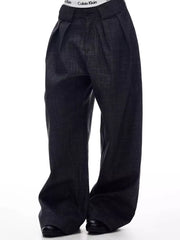 Men's dark grey wide-leg trousers with a subtle textured pattern and a comfortable, elegant fit.