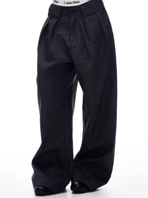 Men's dark grey wide-leg trousers with a subtle textured pattern and a comfortable, elegant fit.