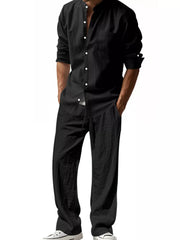 Black linen blend casual two-piece set for men, featuring a band collar shirt and relaxed fit pants.