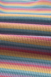 Rainbow stripe lounge set fabric detail, soft cotton waffle knit with pastel stripes.