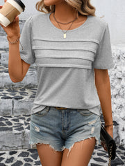 Light gray jersey top with pleated bodice detail and short sleeves.
