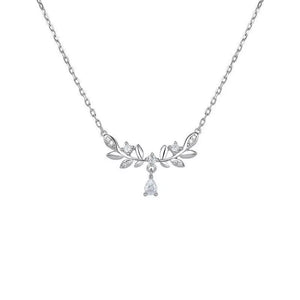 Silver zircon flower pendant necklace with delicate leaf design and pear-shaped drop.