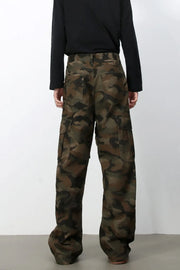 Cargo Camo Wide-Leg Utility Trousers in green camouflage with multiple cargo pockets.