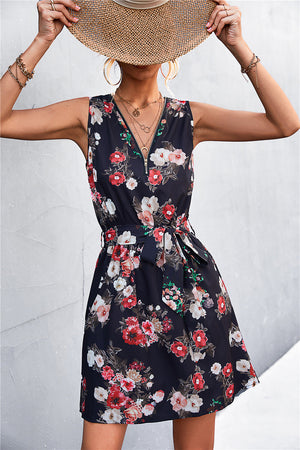 Black floral zip-front mini dress with tie waist and V-neck