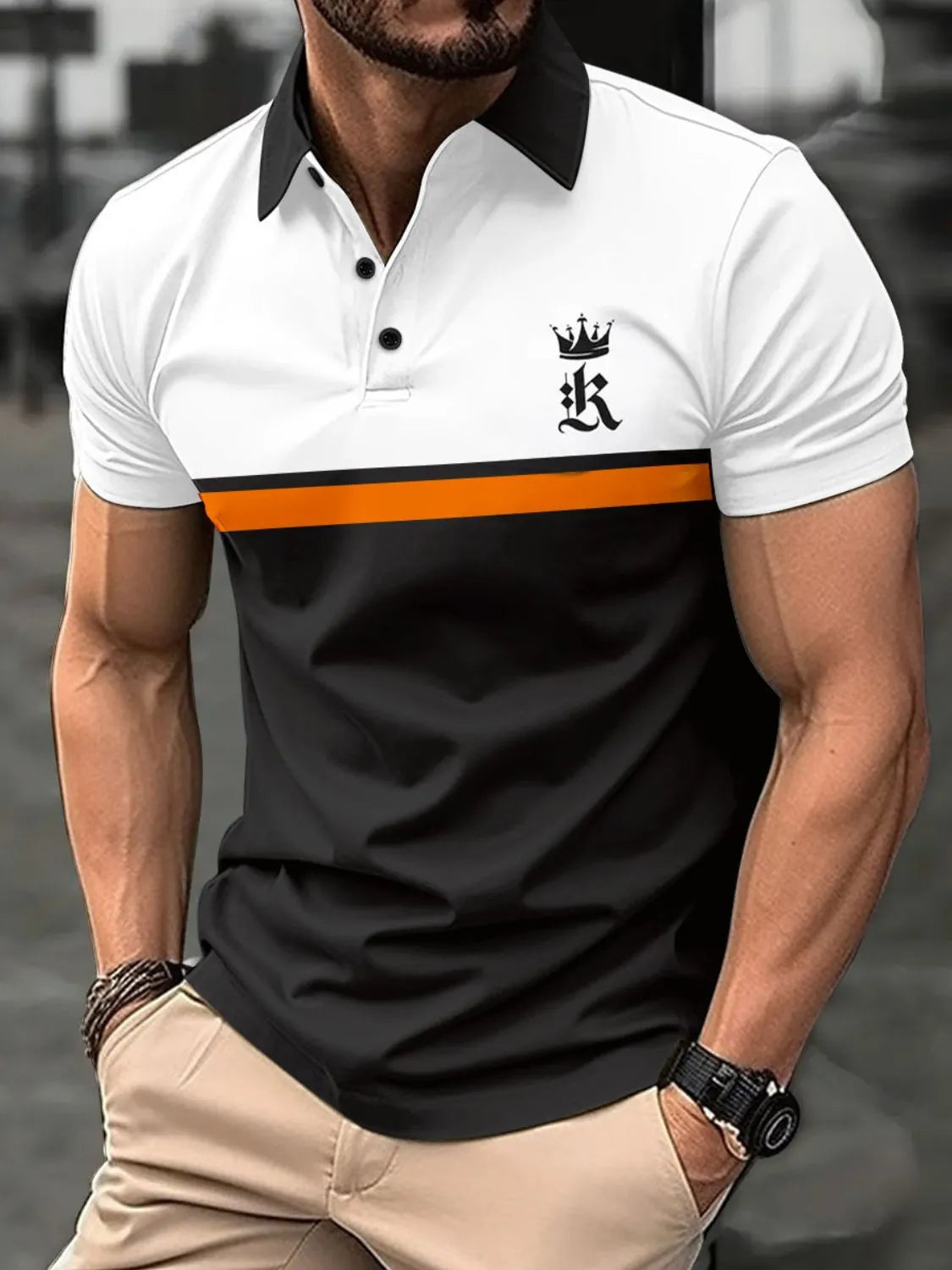 Colorblock polo shirt with black collar, white top, orange stripe, and black bottom, featuring a crown graphic.