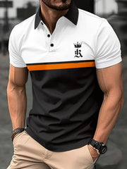 Colorblock polo shirt with black collar, white top, orange stripe, and black bottom, featuring a crown graphic.