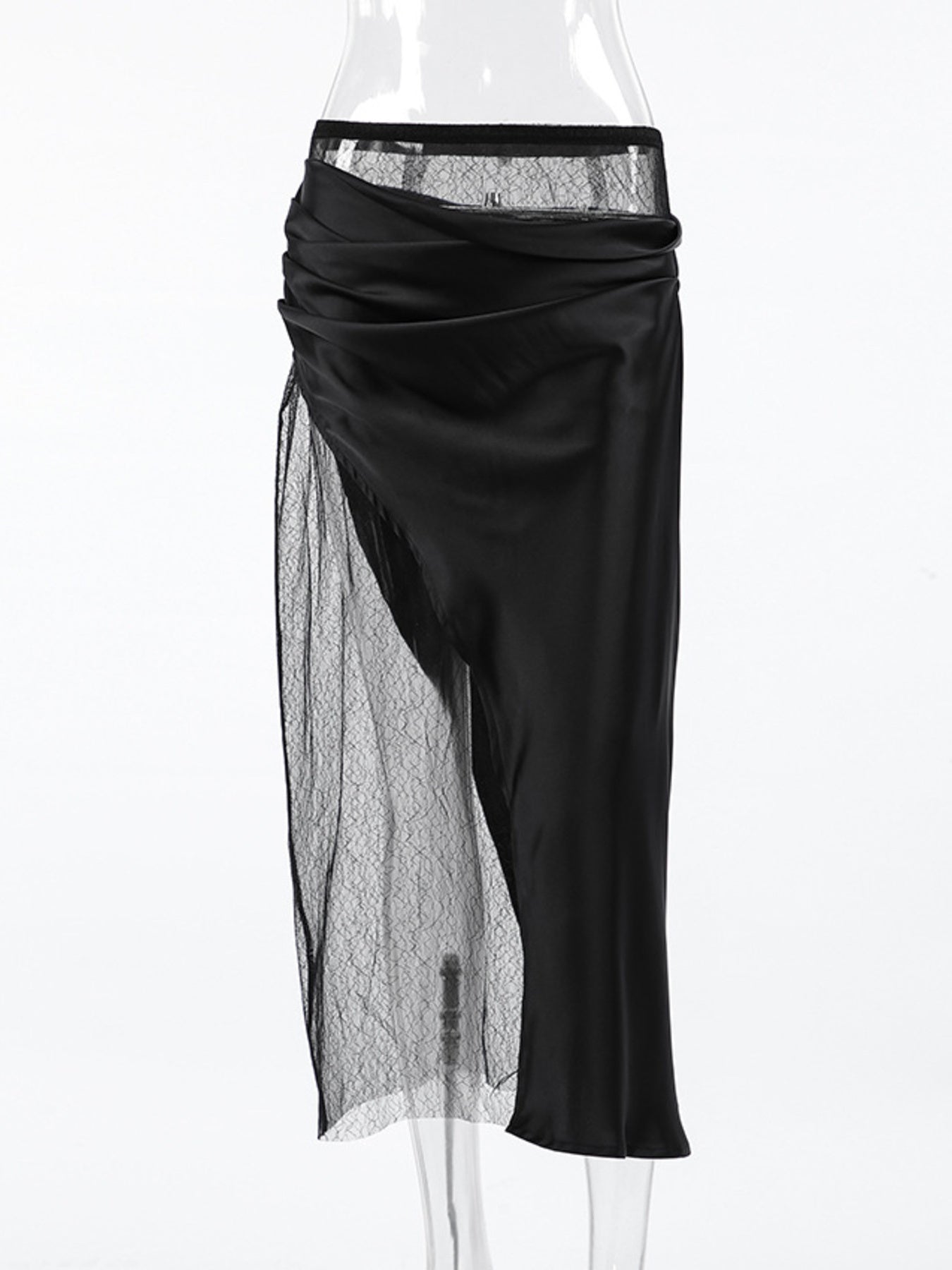 Black midi skirt with asymmetrical sheer lace panel and ruched satin overlay.