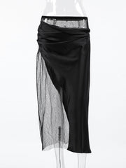 Black midi skirt with asymmetrical sheer lace panel and ruched satin overlay.