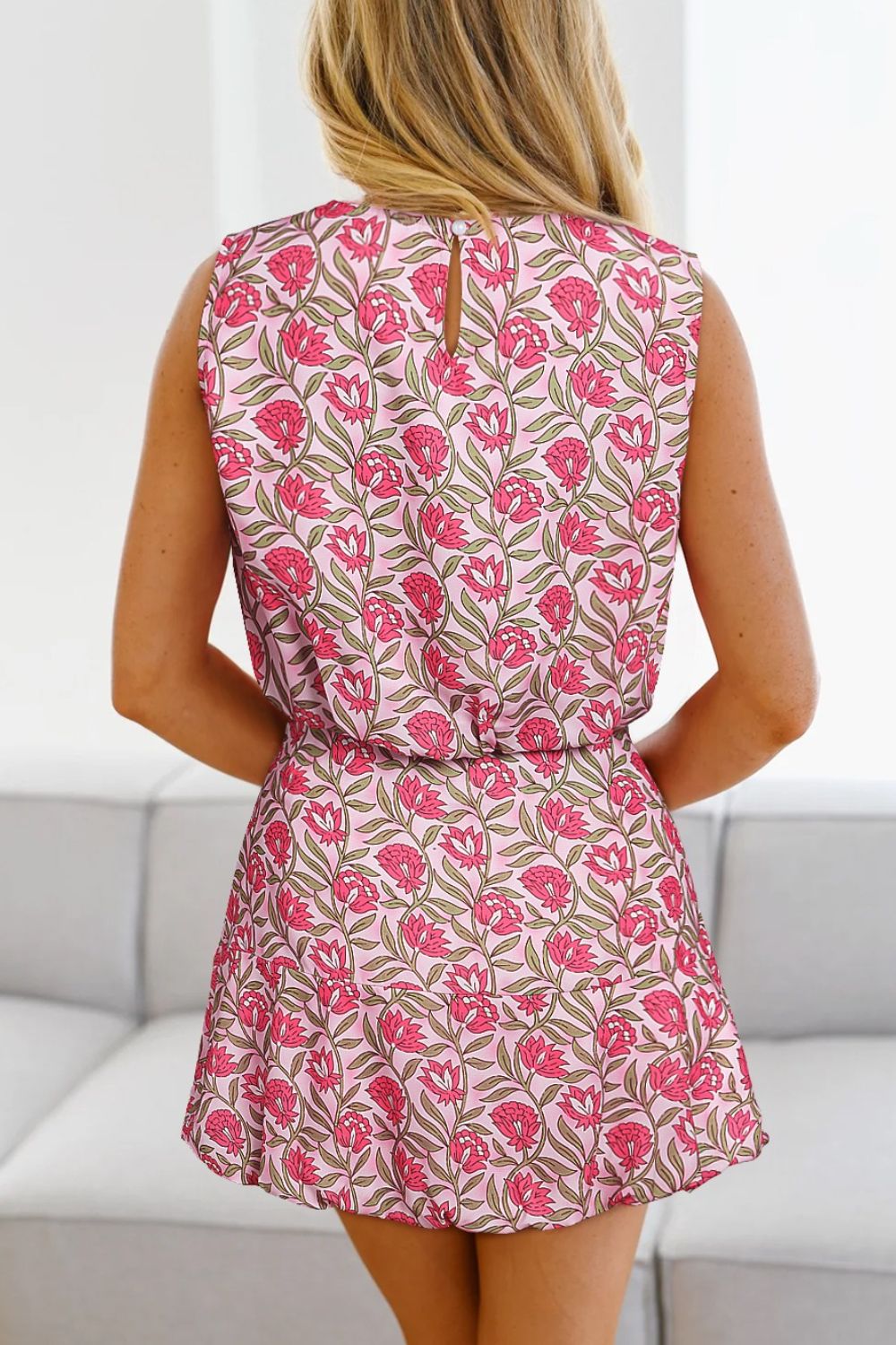 Floral print crop top and A-line skirt set in dusty pink with pink blooms.