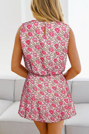 Floral print crop top and A-line skirt set in dusty pink with pink blooms.