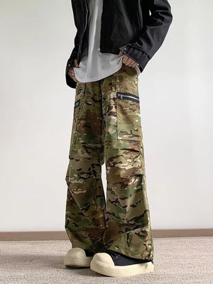 Oversized camouflage cargo pants with zipper pockets and a relaxed fit.