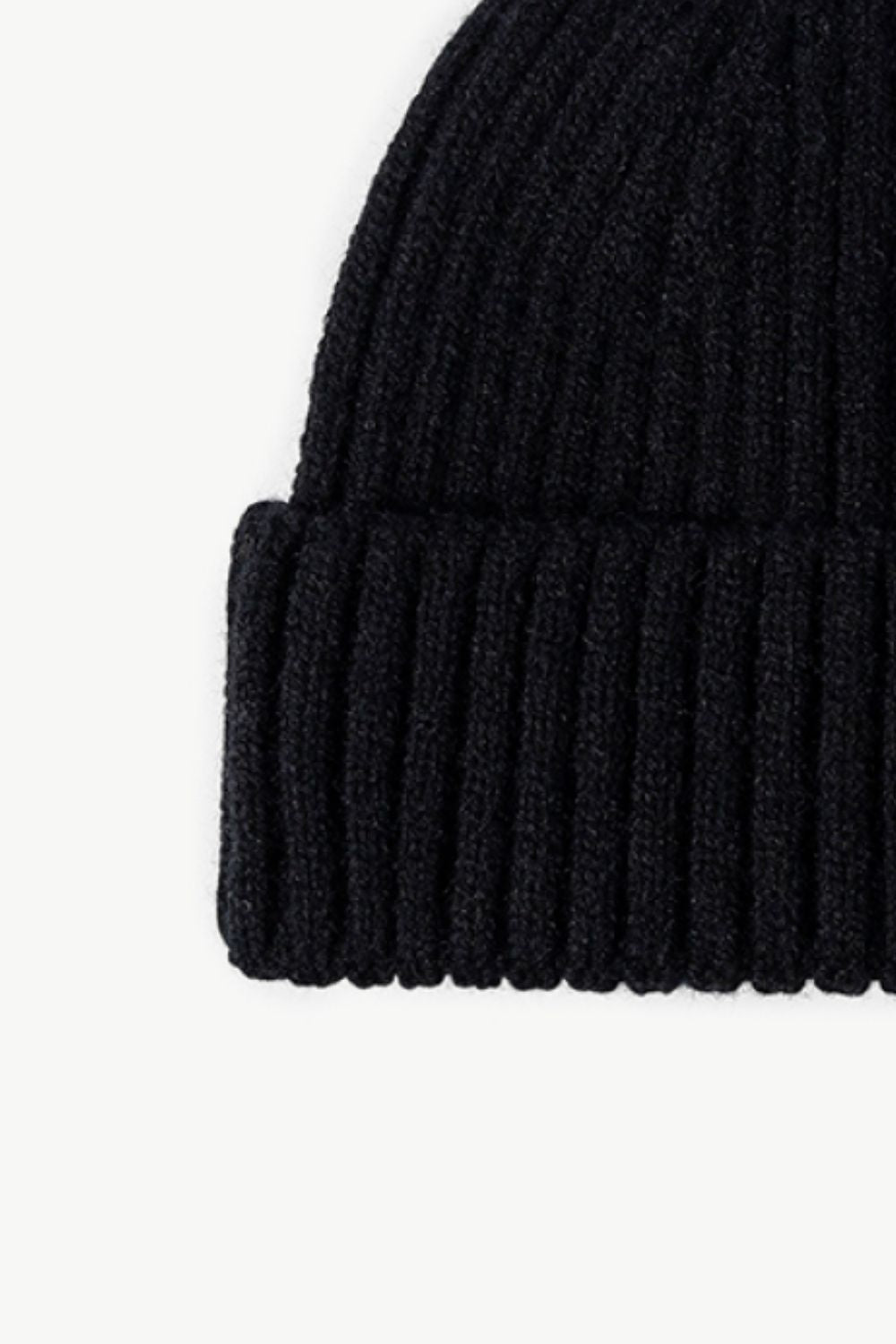 Black chunky ribbed knit beanie with a cuffed hem