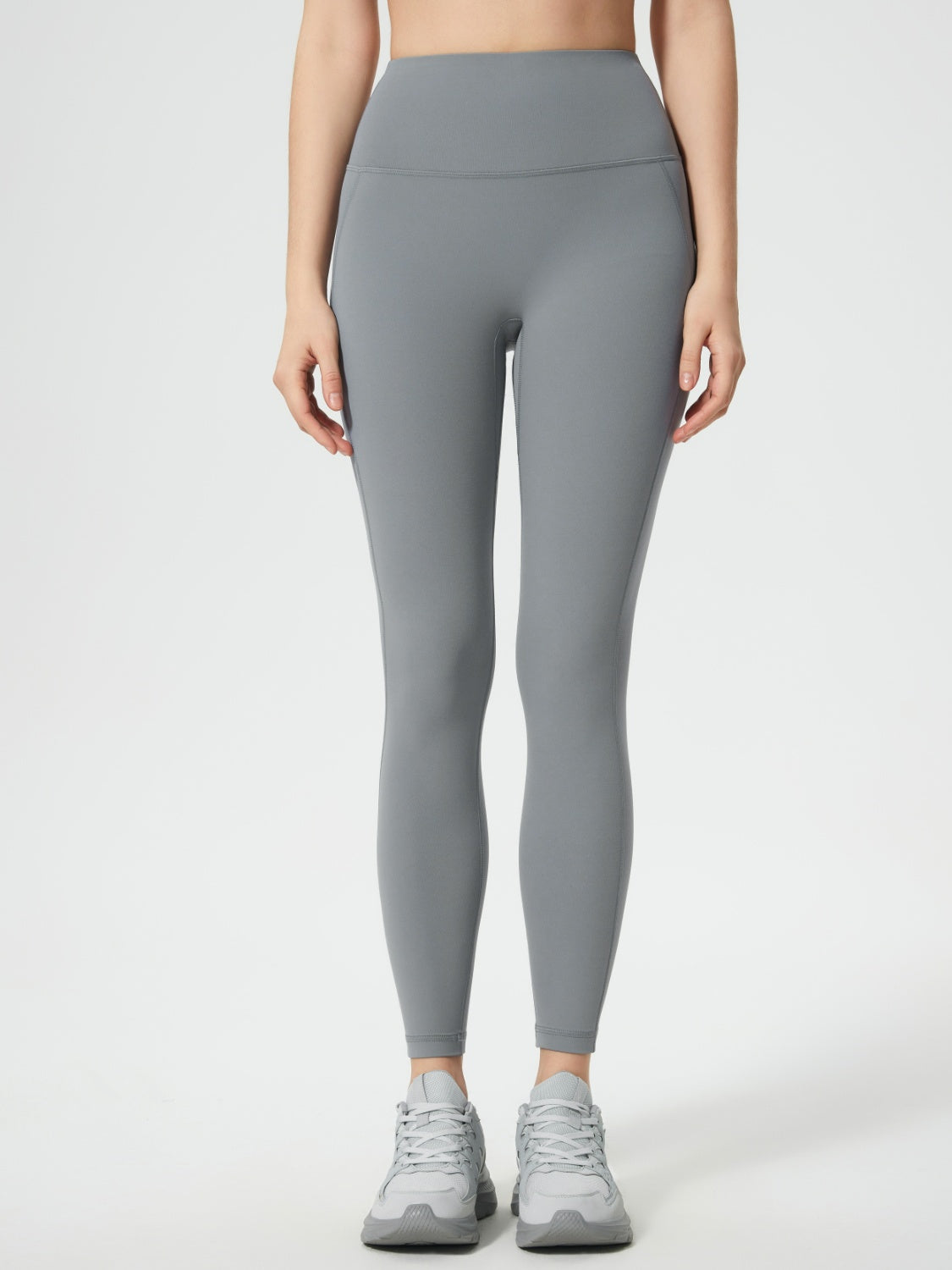 Gray sculpted contour leggings with side pocket detail and high waist.