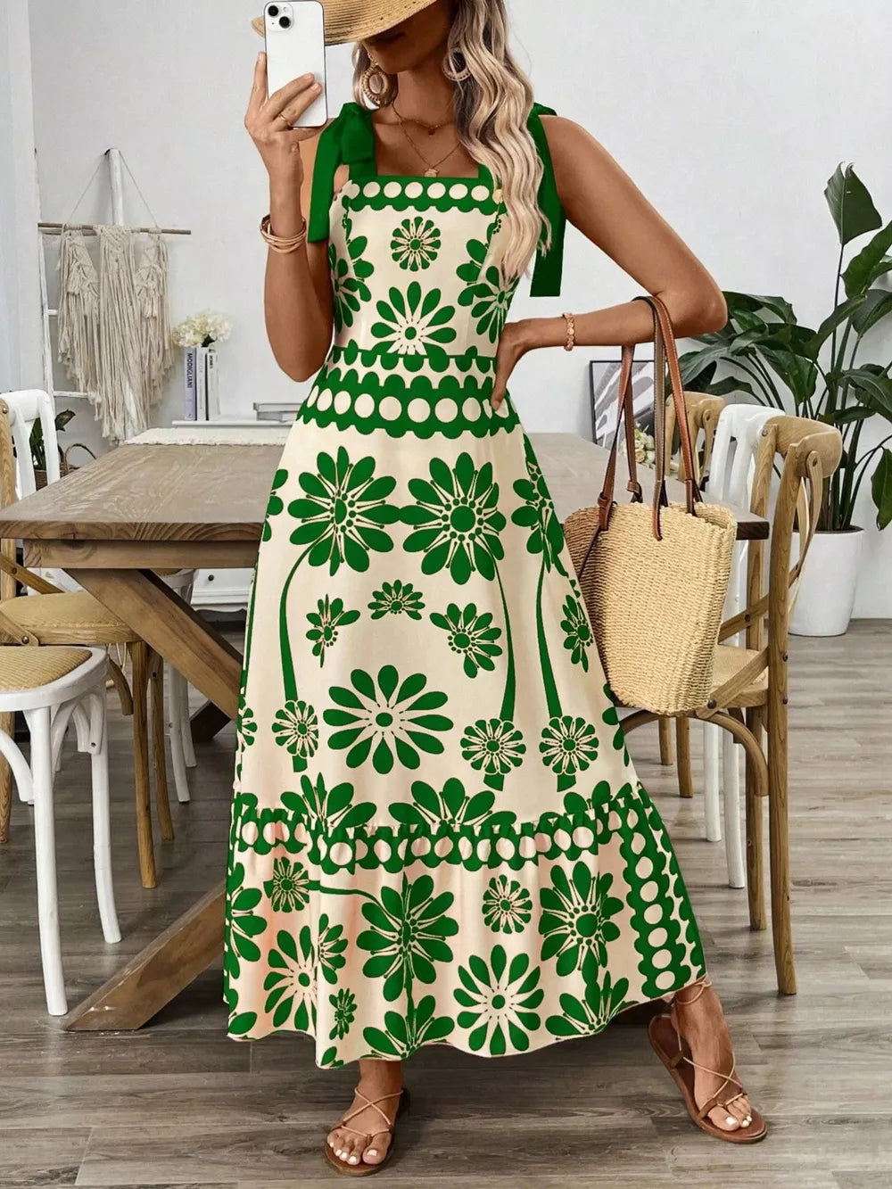 Charming floral tie-shoulder midi dress in cream with green floral print and square neckline.