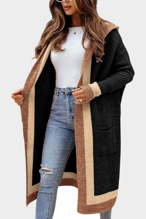 Color-blocked hooded knit maxi cardigan in black with tan and brown trim, featuring pockets.