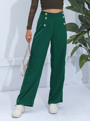 Dark green wide-leg trousers with gold button detail and a high waist.