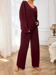 Burgundy ribbed loungewear set with wide-leg pants and a v-neck top.