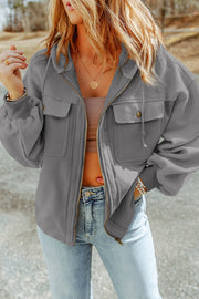 Textured utility hoodie jacket in grey with zip front, chest pockets and drawstring hood.