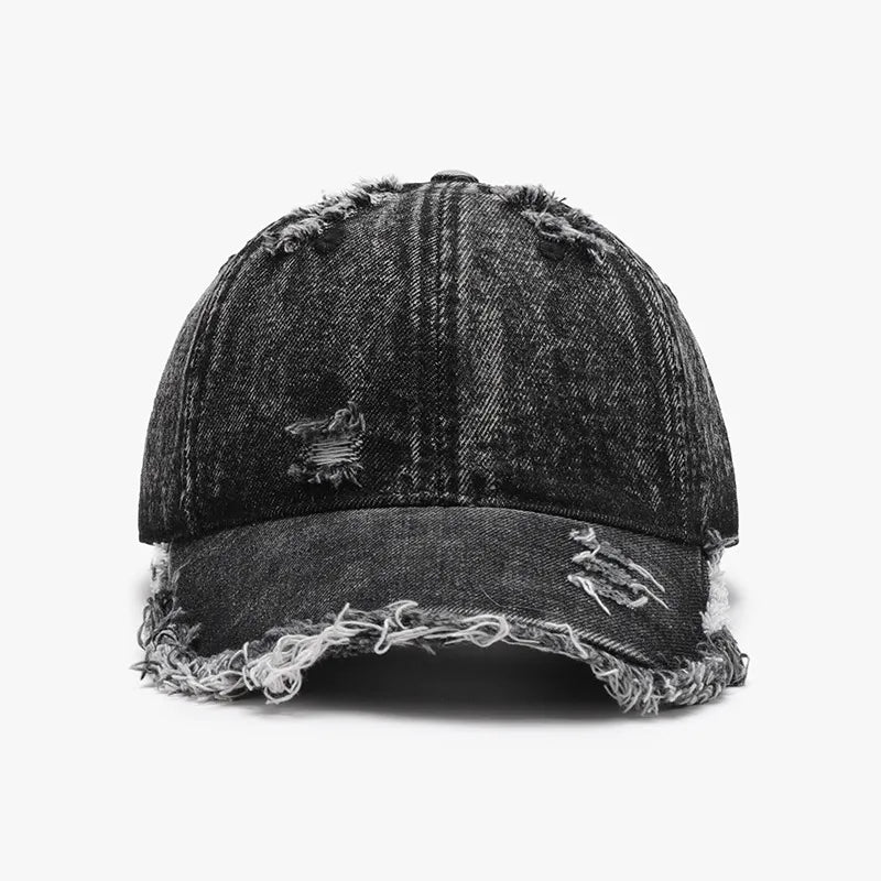 Dark acid wash denim baseball cap with frayed edges and distressed details.