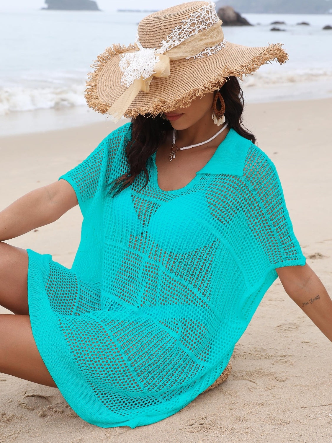 Aqua open-knit polo beach dress with short sleeves and a relaxed fit.