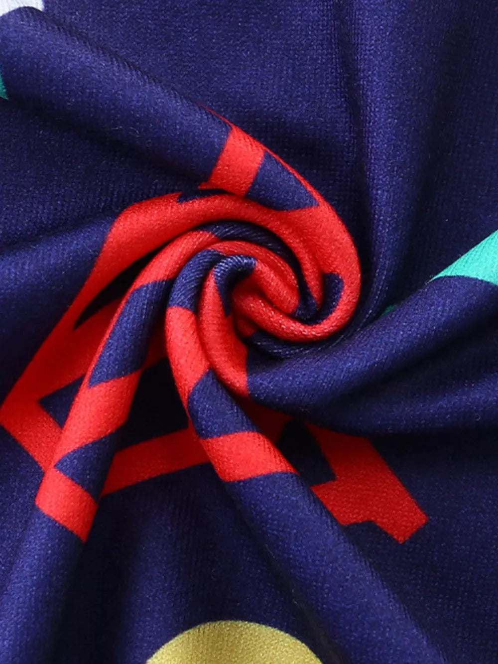 Baby tee and shorts set with sporty red and green graphics on navy blue fabric.