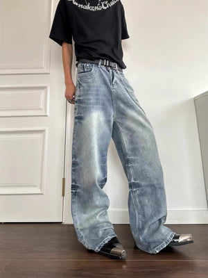 Men's light wash blue cotton wide leg jeans with a relaxed fit and distressed details.