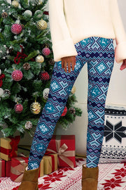 Festive Fair Isle leggings in cerulean blue with snowflake and reindeer pattern.