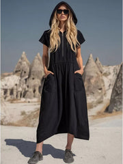 Black hooded midi dress with short sleeves, zip neckline, elastic waist, and functional pockets.